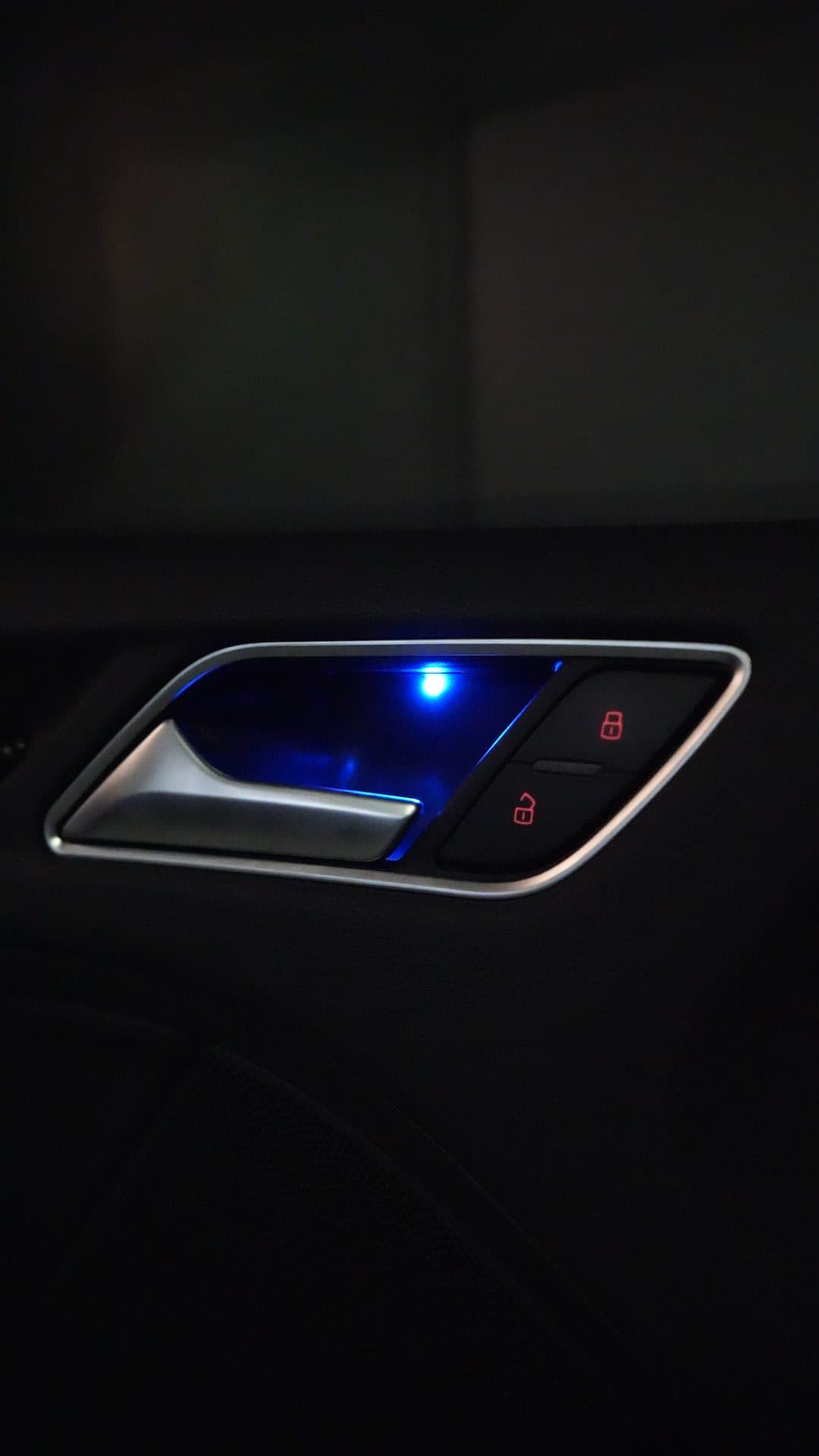 Audi S3 — illuminated door handle close-up