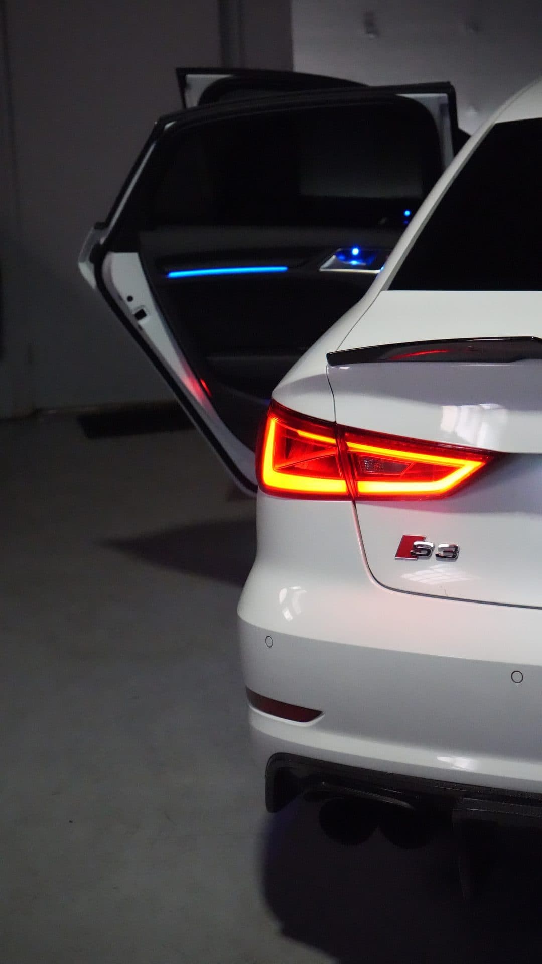 Audi S3 — exterior with door open, blue ambient inside