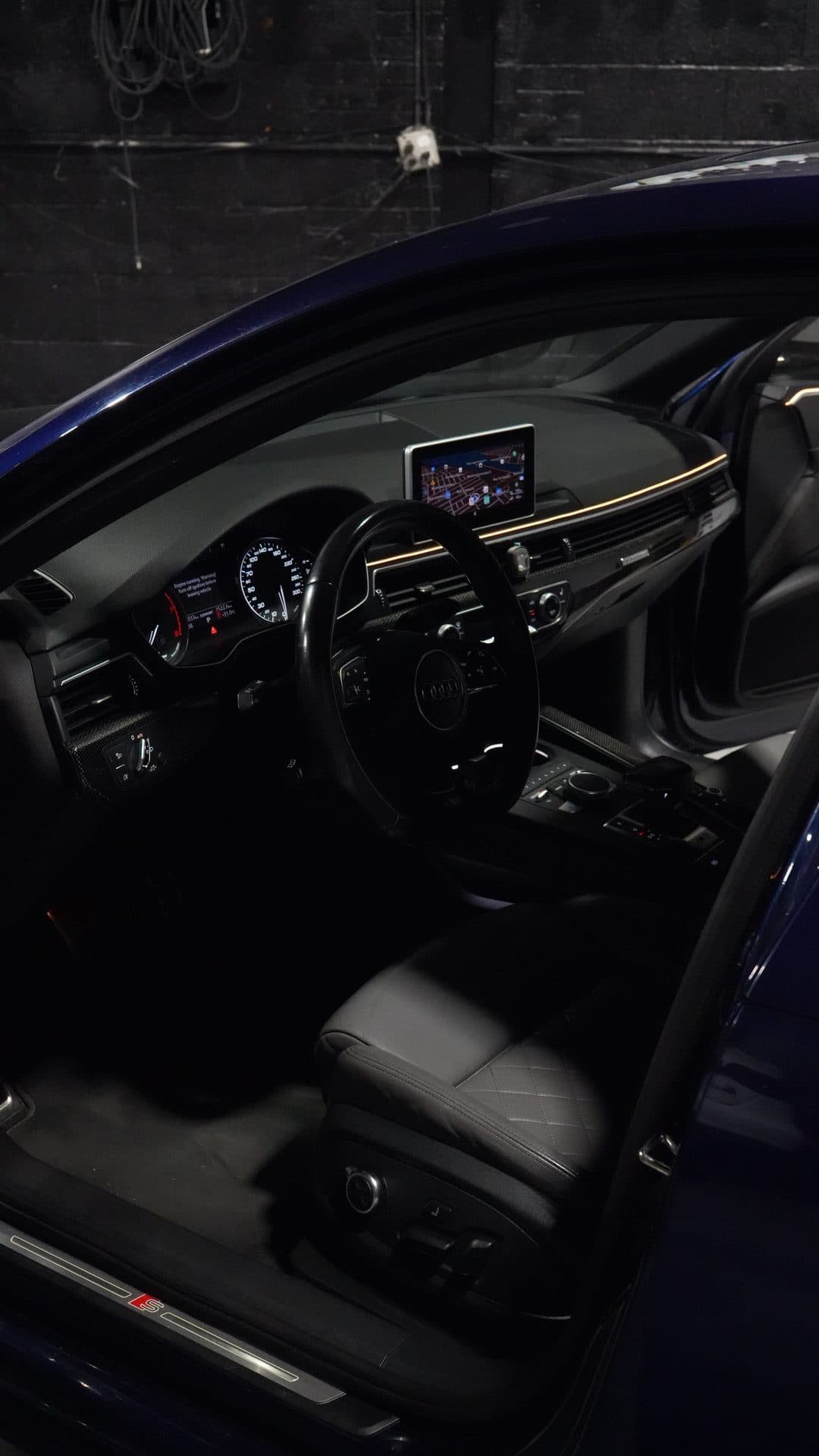Audi S5 — cockpit with warm gold ambient dash strip