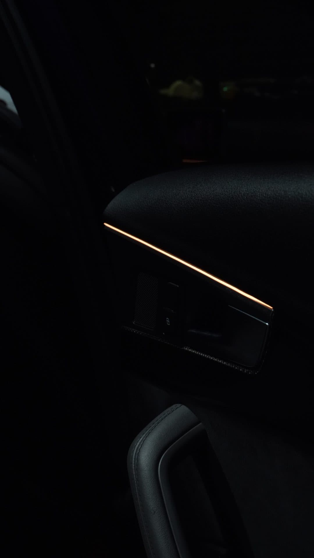 Audi S5 — door panel gold ambient strip from outside