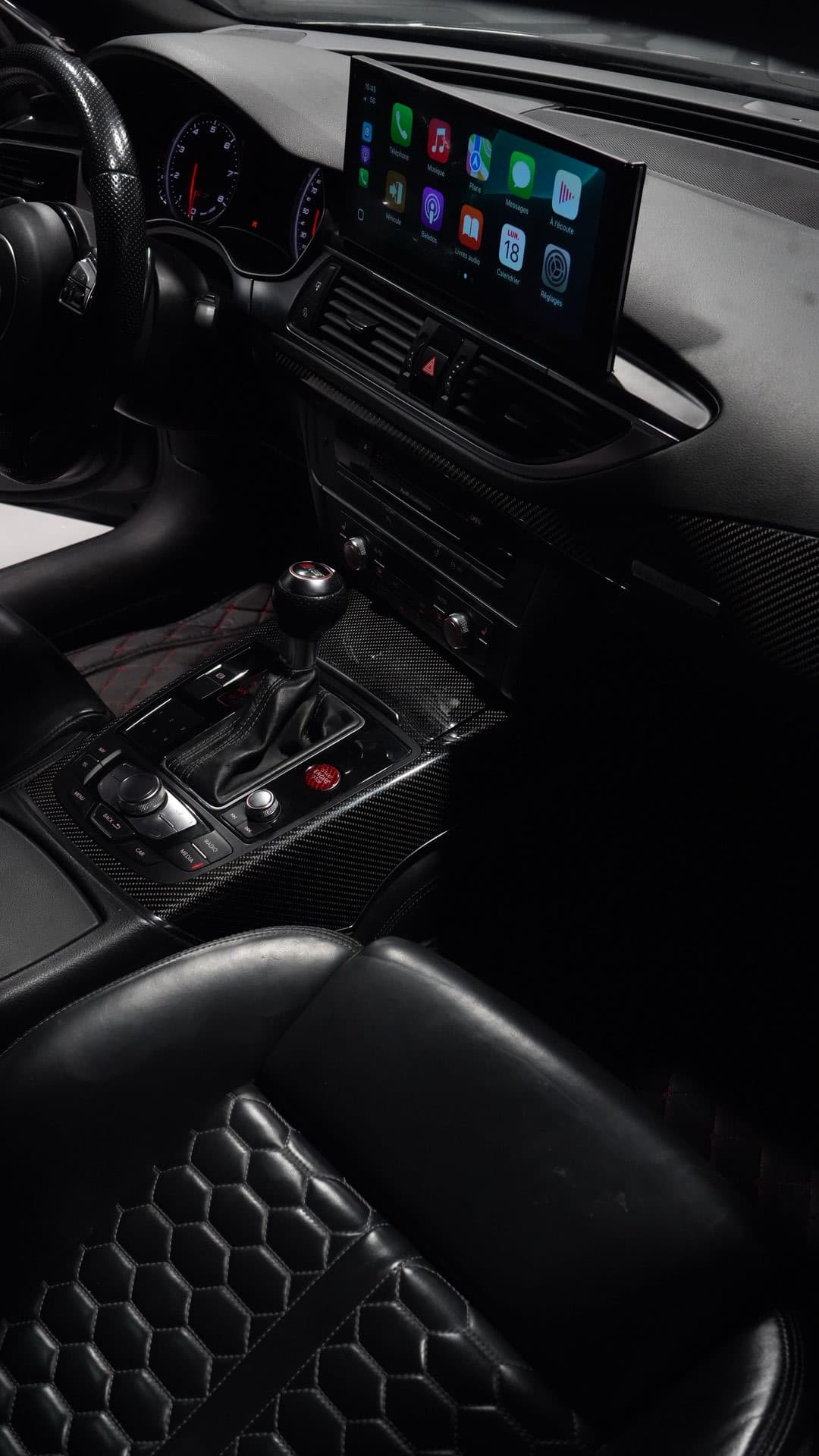 Audi — full carbon fiber center console and trim panels