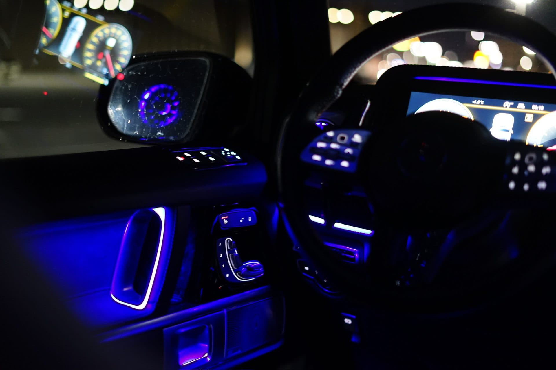 G-Wagon — cockpit lit purple at night