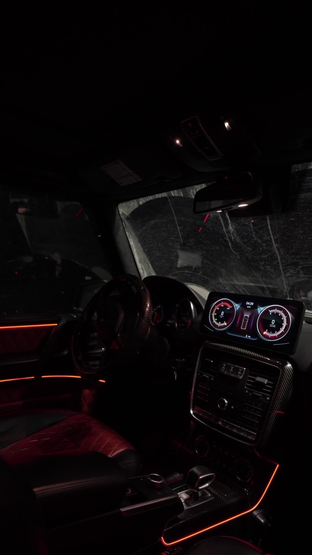 G-Wagon AMG — overhead cockpit, red strips and carbon