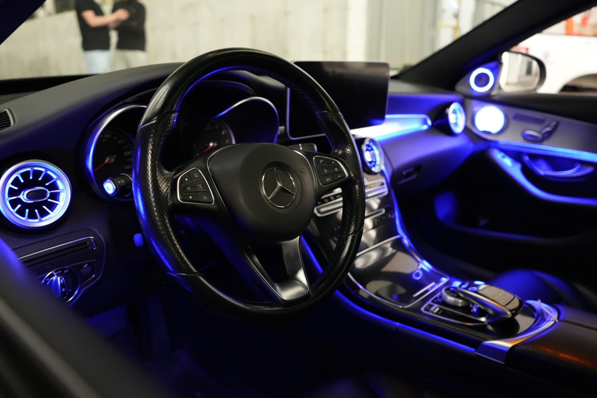 Mercedes C-Class — wide interior, ambient glow throughout