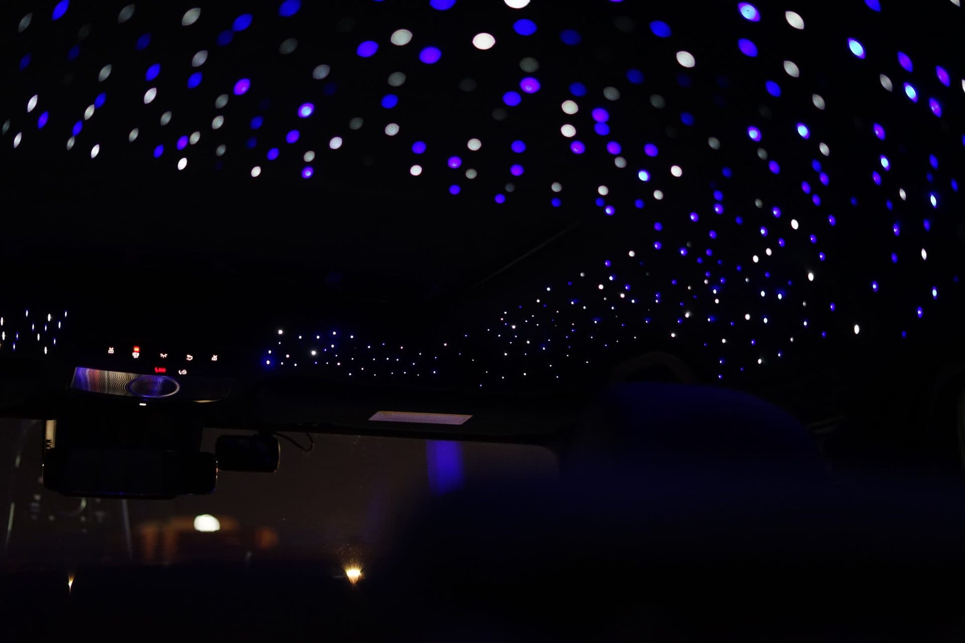 G-Wagon starlight — driven at night, city lights below