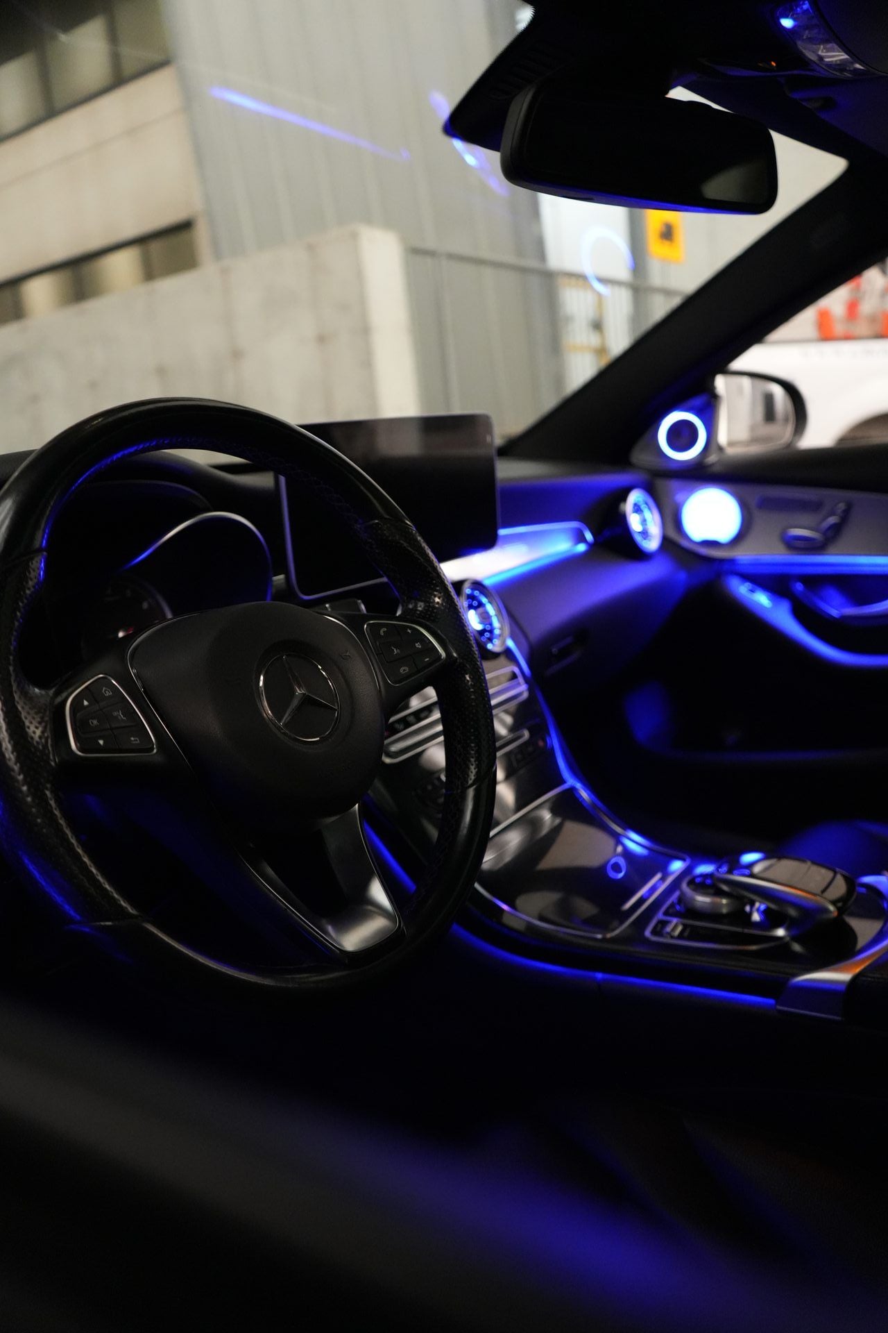Premium car interior with blue ambient lighting